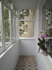 Отделка балконной стены. Низкие цены.